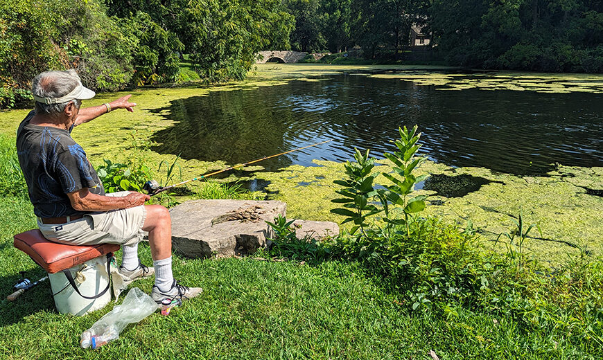 Adult fishing at Delnor Woods Pond